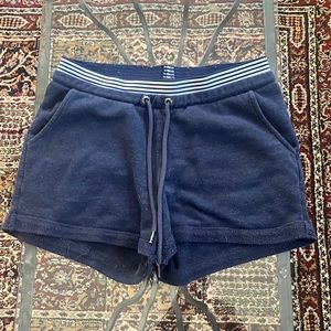 Blue booty shorts with pockets on back